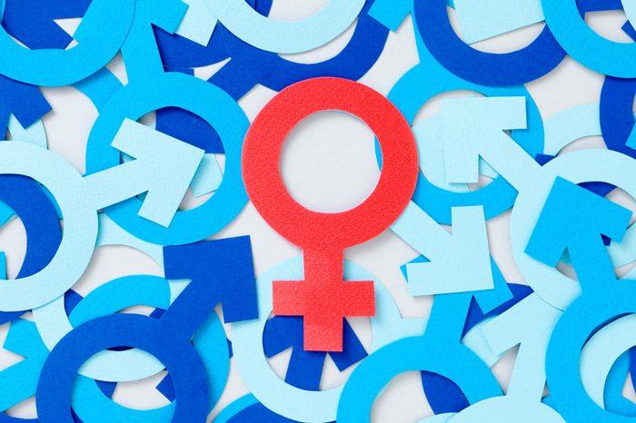 female symbol among male symbols