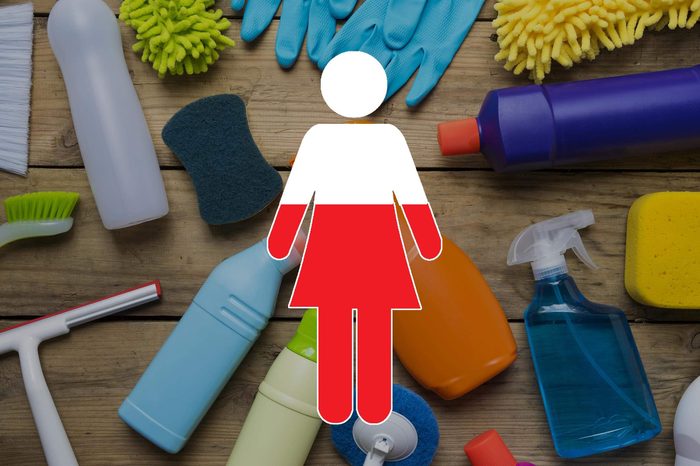 cleaning supplies on wood background with female symbol overlay