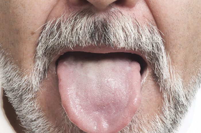 Man sticking out his tongue