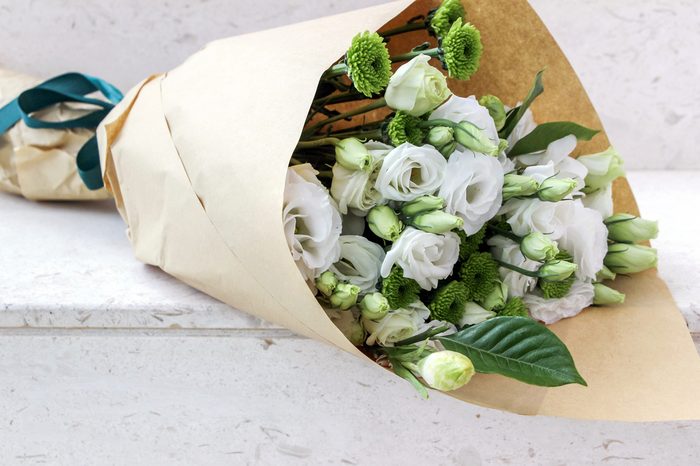 Wrapped white eustoma flowers bouquet