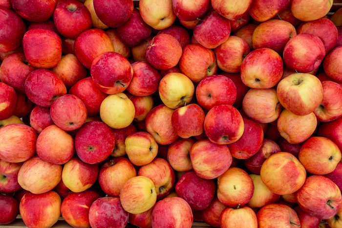 Closeup shot of fresh red and yellow apples