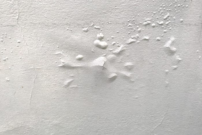 Defect paint color on concrete wall texture background 