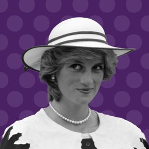 A woman smiles subtly, wearing a white hat and pearl necklace, against a purple polka dot background.