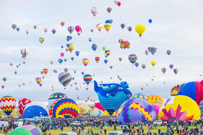 Balloons fly over Albuquerque on October 11, 2014 in Albuquerque, New Mexico. Albuquerque balloon fiesta is the biggest balloon event in the world.