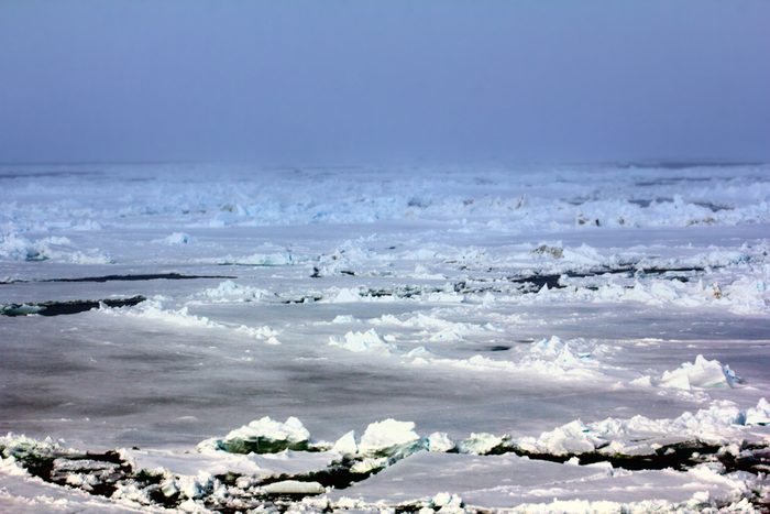 ice at North pole and near (from 88 to 90 degrees). Rare now perennial ice broken by nuclear icebreaker. Broken ice behind (channel), expedition to North pole