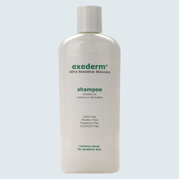 A white shampoo bottle labeled 