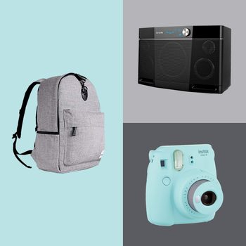 Backpack sits on a teal background; audio speaker and camera displayed on gray sections. Labels: "aiwa" on speaker, "instax mini 9" on camera.