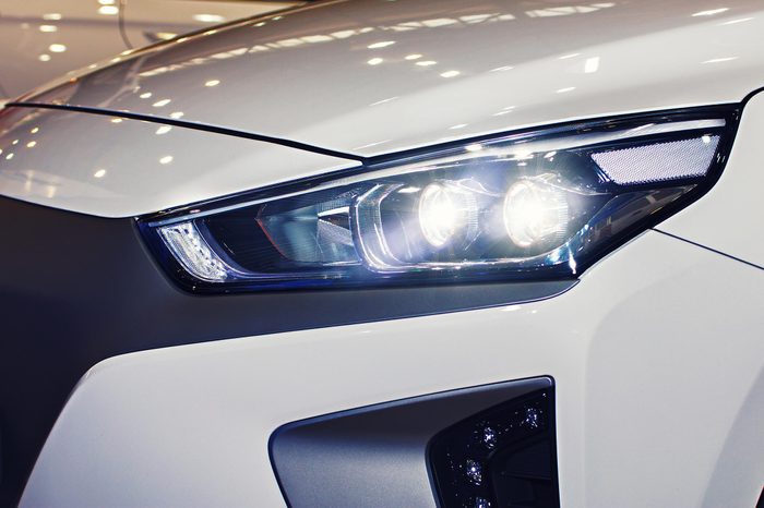 The headlight of the car is close-up. New car