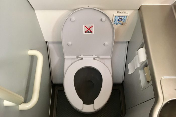 Photo of a lavatory in a commercial airplane.