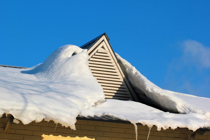 Roof window covered with snow