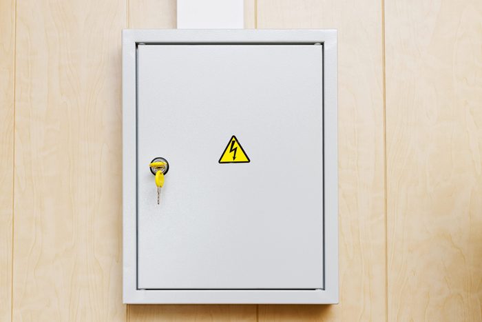 Grey Hinged Power Supply Box on the Wall