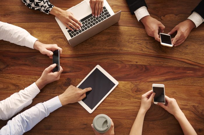 Group of business people using modern technology