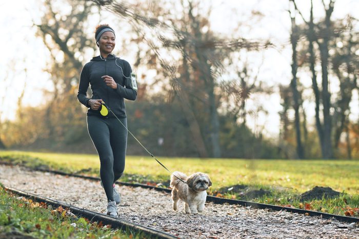 dog running with owner