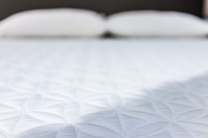 Closeup of mattress on display in store