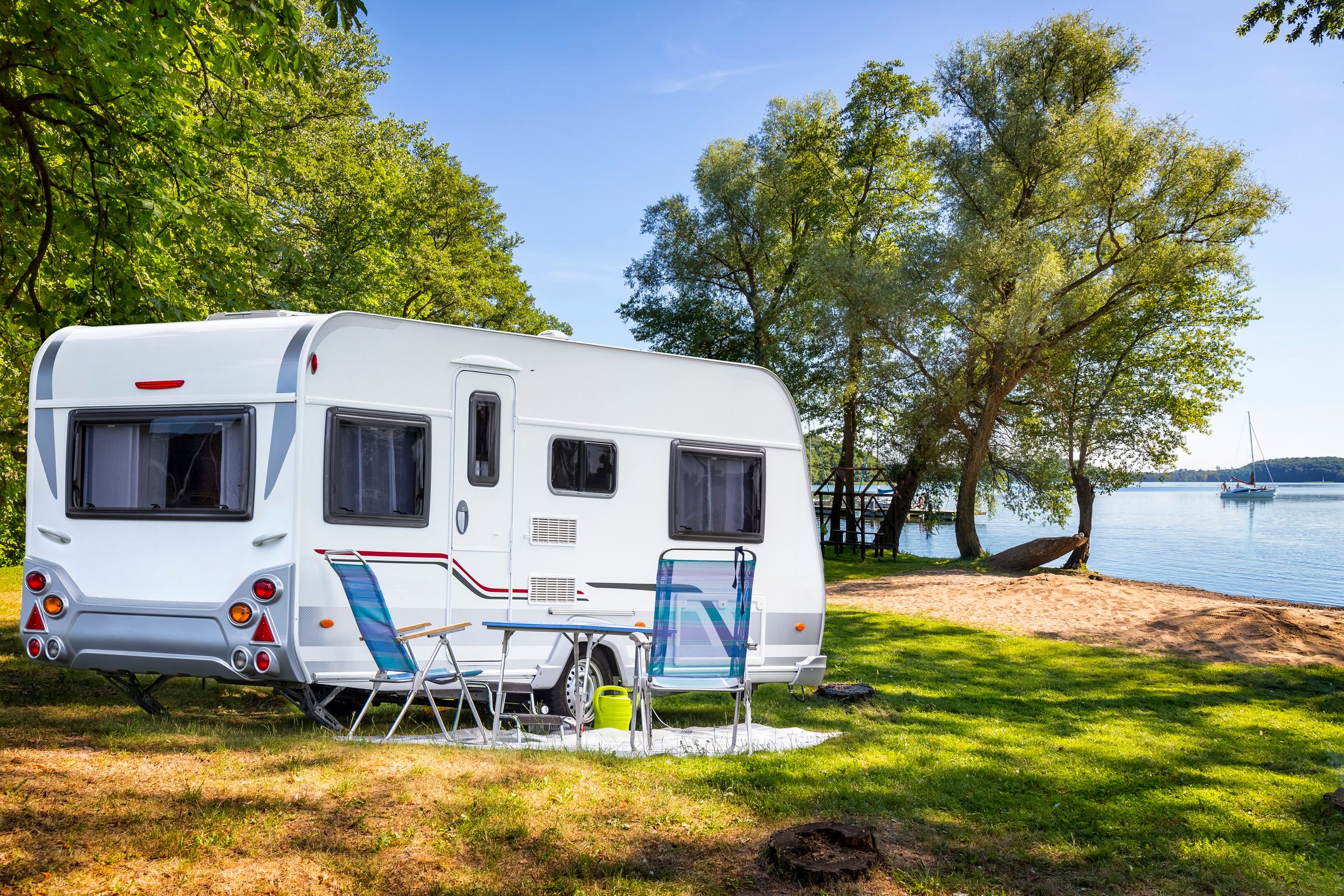 Vacations in Poland - Camper trailer on the shore of bay of the Drawsko lake