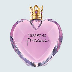 Heart-shaped perfume bottle, adorned with golden crown cap, displays 