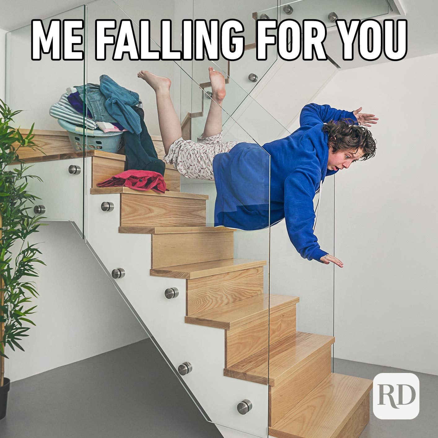 Woman falling down stairs. Meme text: Me falling for you.