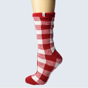Red and white checkered sock displayed on a mannequin leg with 