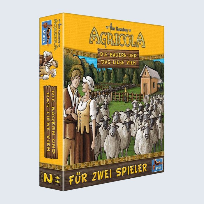 Box cover shows a couple standing with sheep, farm in background; text: 