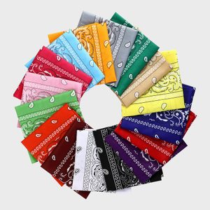 Colorful bandanas arranged in a circle, featuring paisley patterns, with a white background, creating a vibrant, symmetrical display.