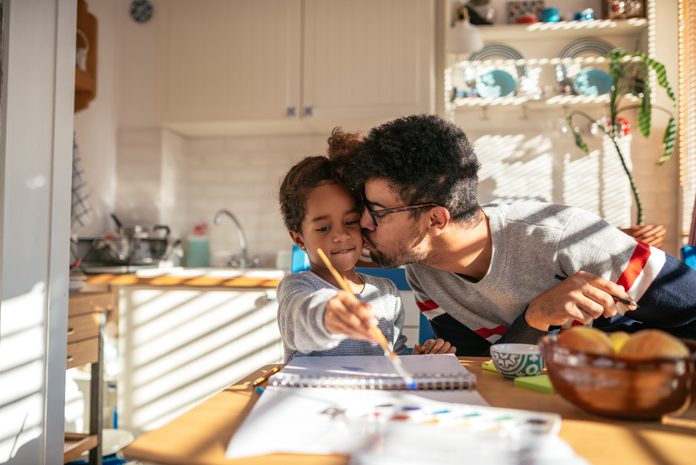 father and daughter doing crafts on fathers day