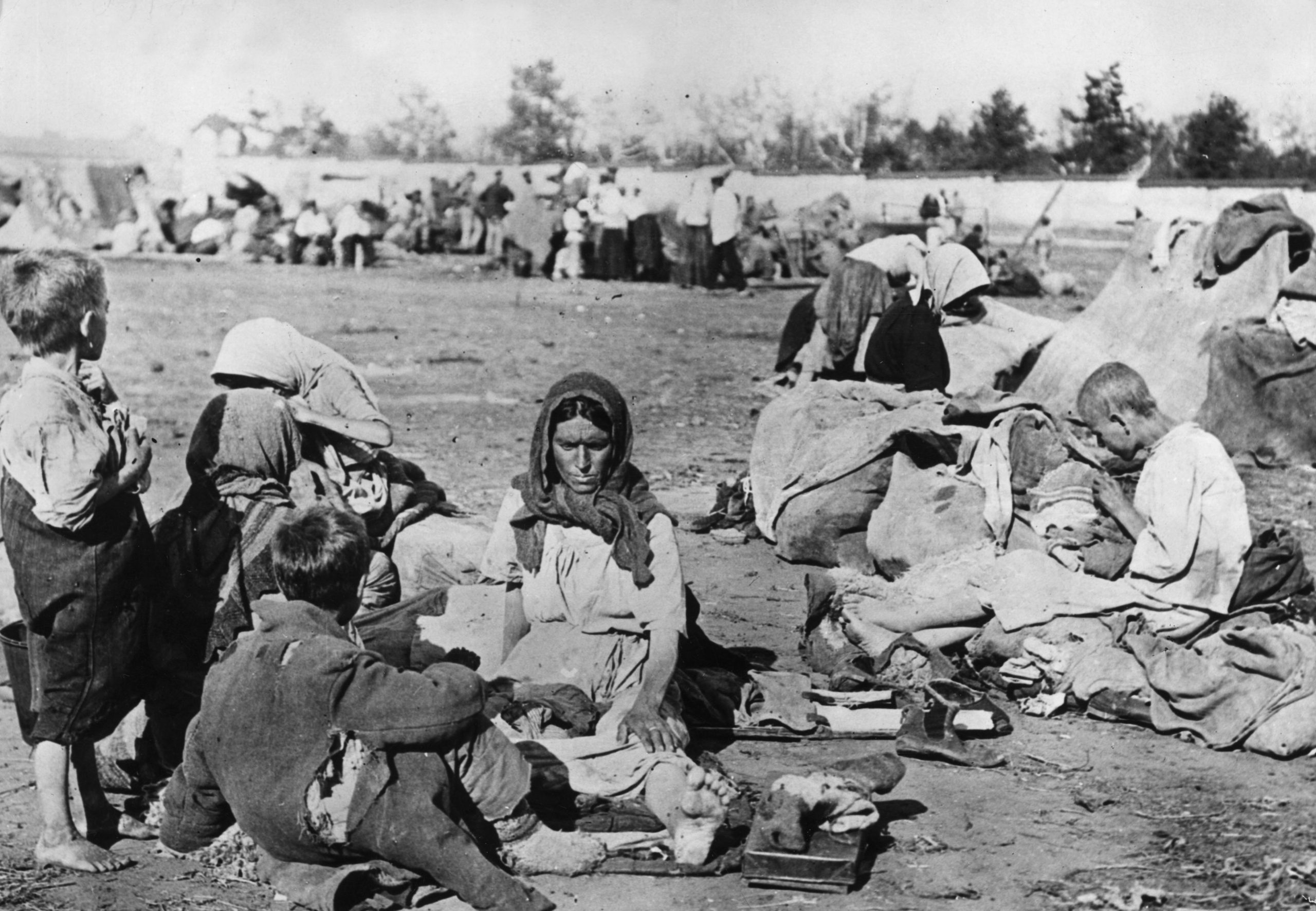 October 1921: Ragged and barefoot, starving Russian families in the Volga area during the Russian Famine.