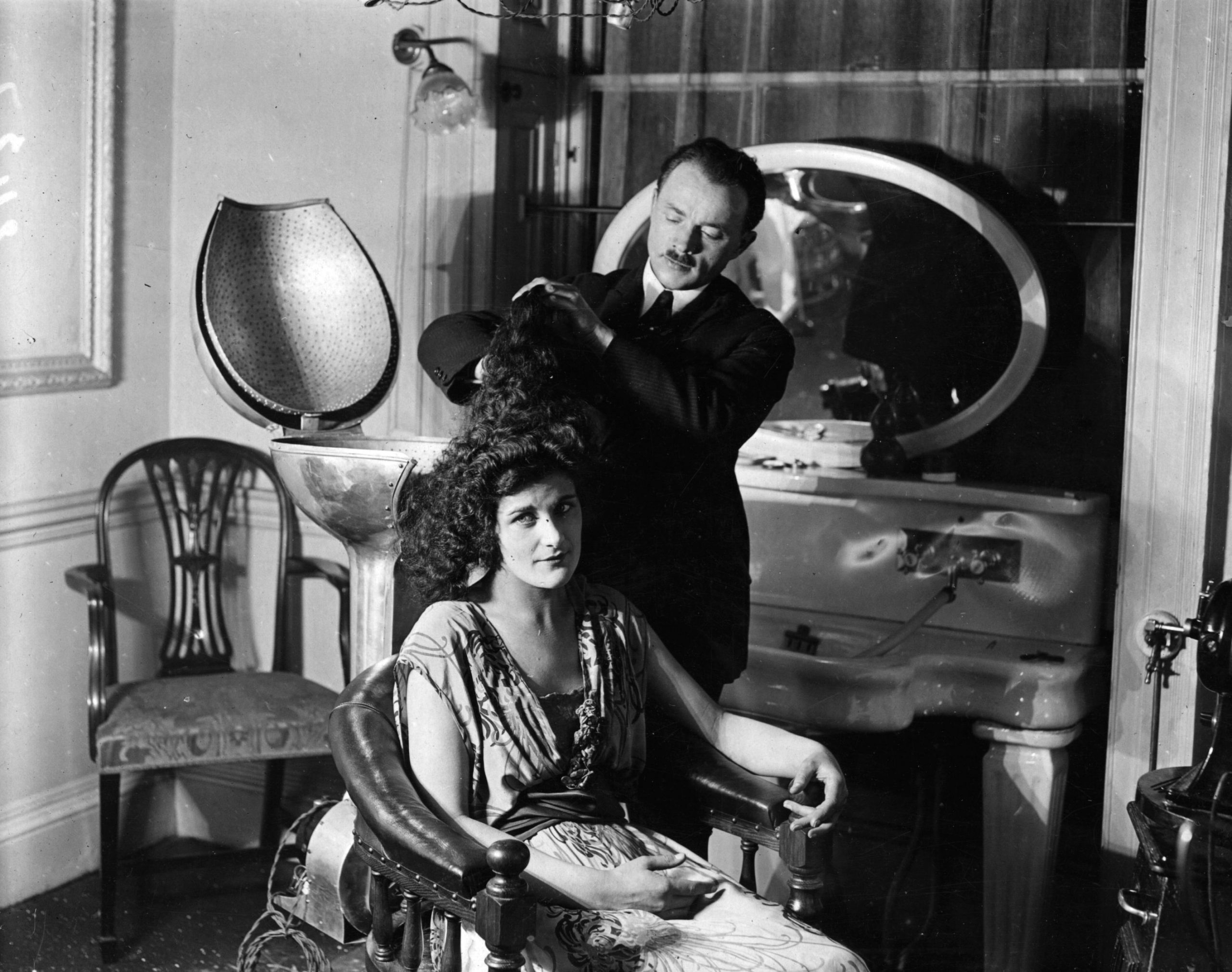 Woman getting hair permed