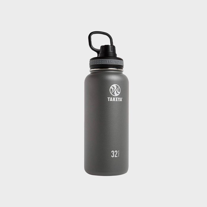 Gray insulated water bottle standing upright, featuring a black lid with a handle. Marked with 