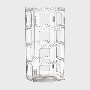 Clear, cylindrical rotating rack with tiered slots, designed for organizing. The structure is tall and stands upright against a plain, light background.