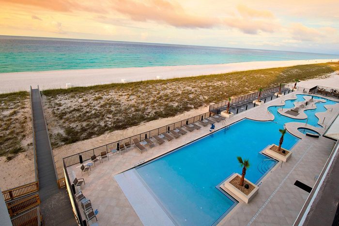view of Navarre beach and hotel pool at Springhill Suites Navarre Beach florida
