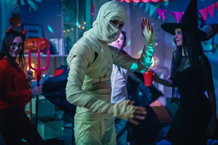 people dancing to music at halloween party