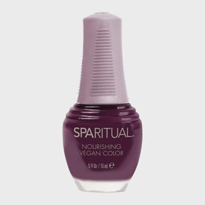 Nail polish bottle stands upright, labeled 