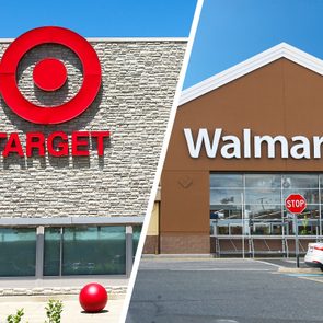 Target and Walmart storefronts contrast in daylight; Target features stone facade, large red logo, while Walmart has brown facade and white text logo.