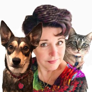 Person smiles with dog and cat, both looking forward; colorful attire, against a plain white backdrop.