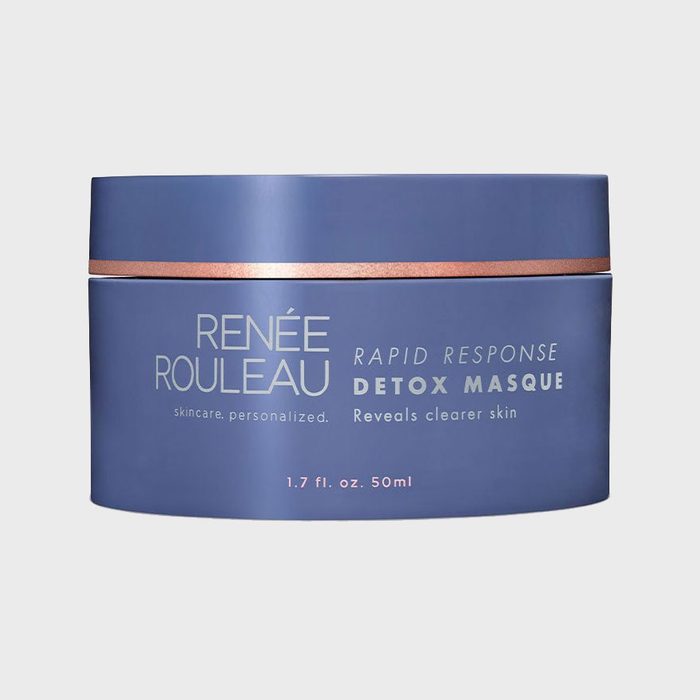 A blue cosmetic jar labeled 