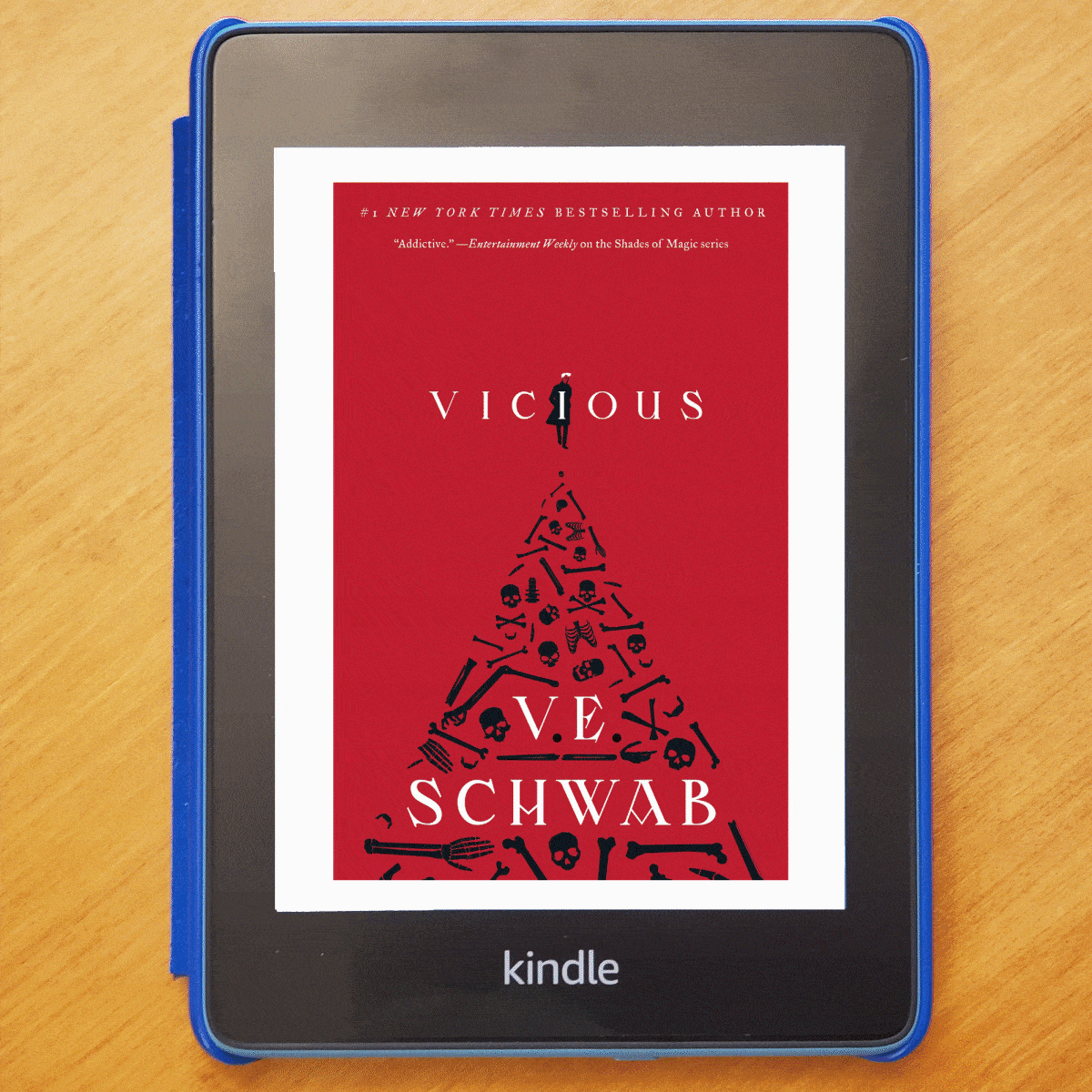 Kindle displays a red book cover titled 