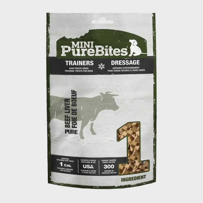 Dog treats in a green and white package show beef liver chunks. Text highlights raw freeze-dried training treats, 1 calorie each, USA sourced.