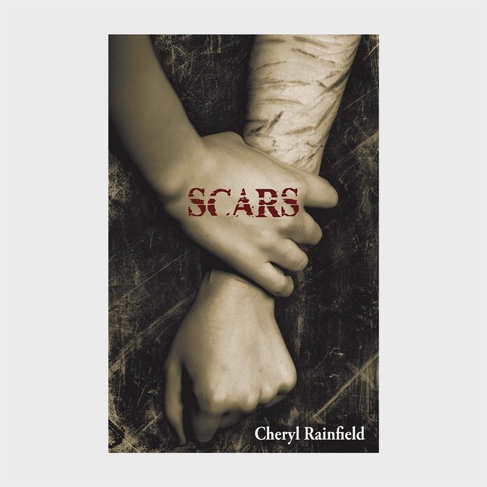 Two hands grip a scarred arm in a textured dark background. Text reads 