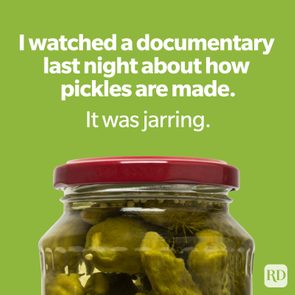 Jar of pickles sits; green background with text: 
