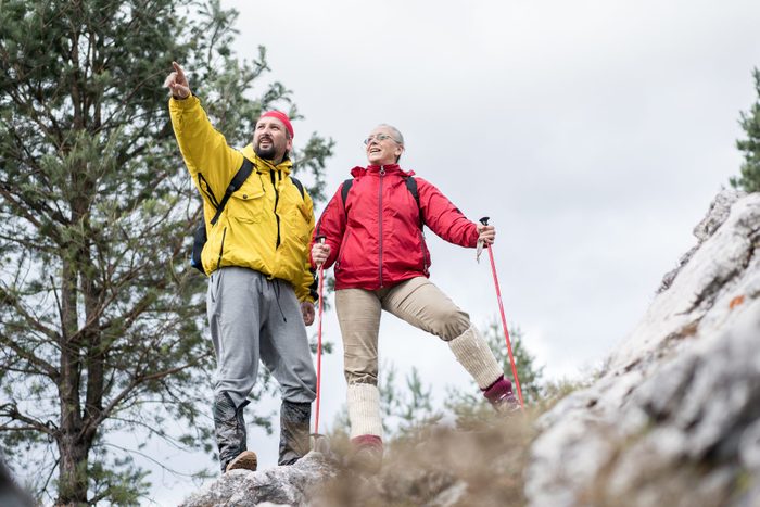 Two people climbed on mountain cliff