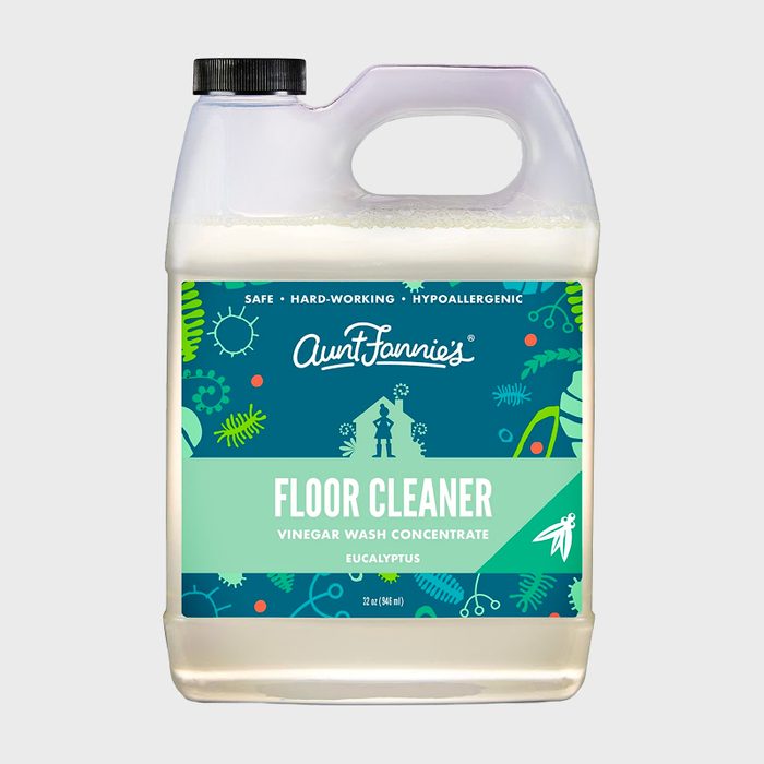 Container holds floor cleaner labeled 