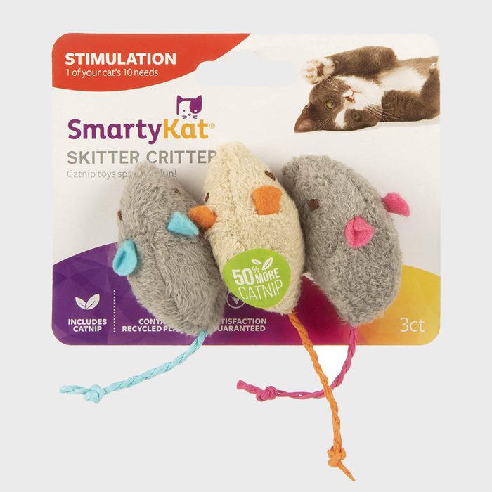 Three plush toy mice displayed with colorful ears and tails, packaged on a branded card reading 