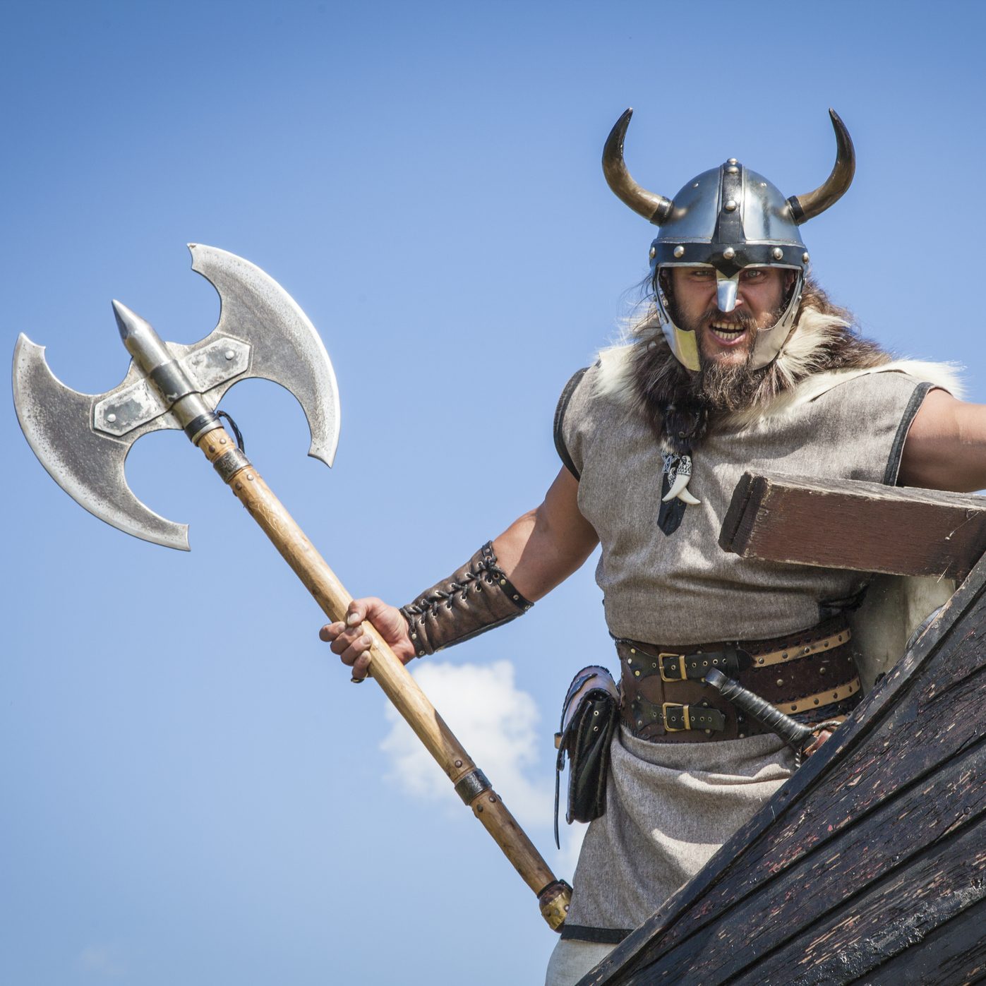 Strong angry Viking on his ship