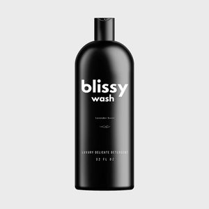 A black bottle displays 