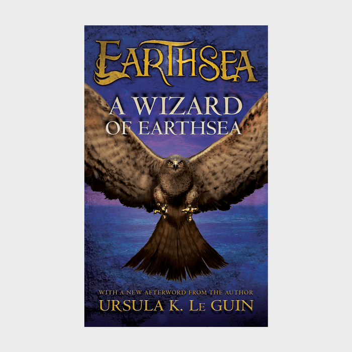 Hawk soars with wings spread wide against a textured blue background; large gold and white text reads, 