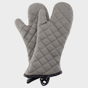 Gray quilted oven mitts laying side by side on a plain white background.