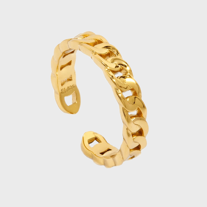 A gold chain-style ring with stamped 