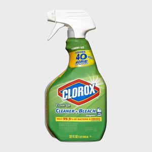 Spray bottle stands upright; labeled 