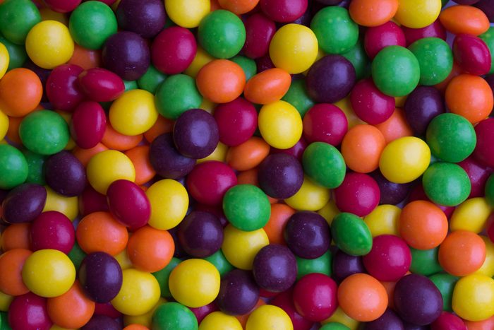 full frame of skittles and M&Ms