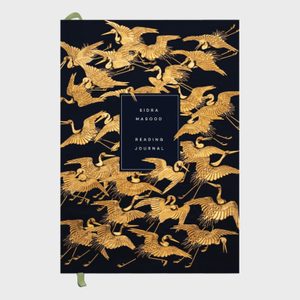 Journal with golden cranes flying on a dark background; text reads â€œSIDRA MASOOD READING JOURNALâ€ in a central box.